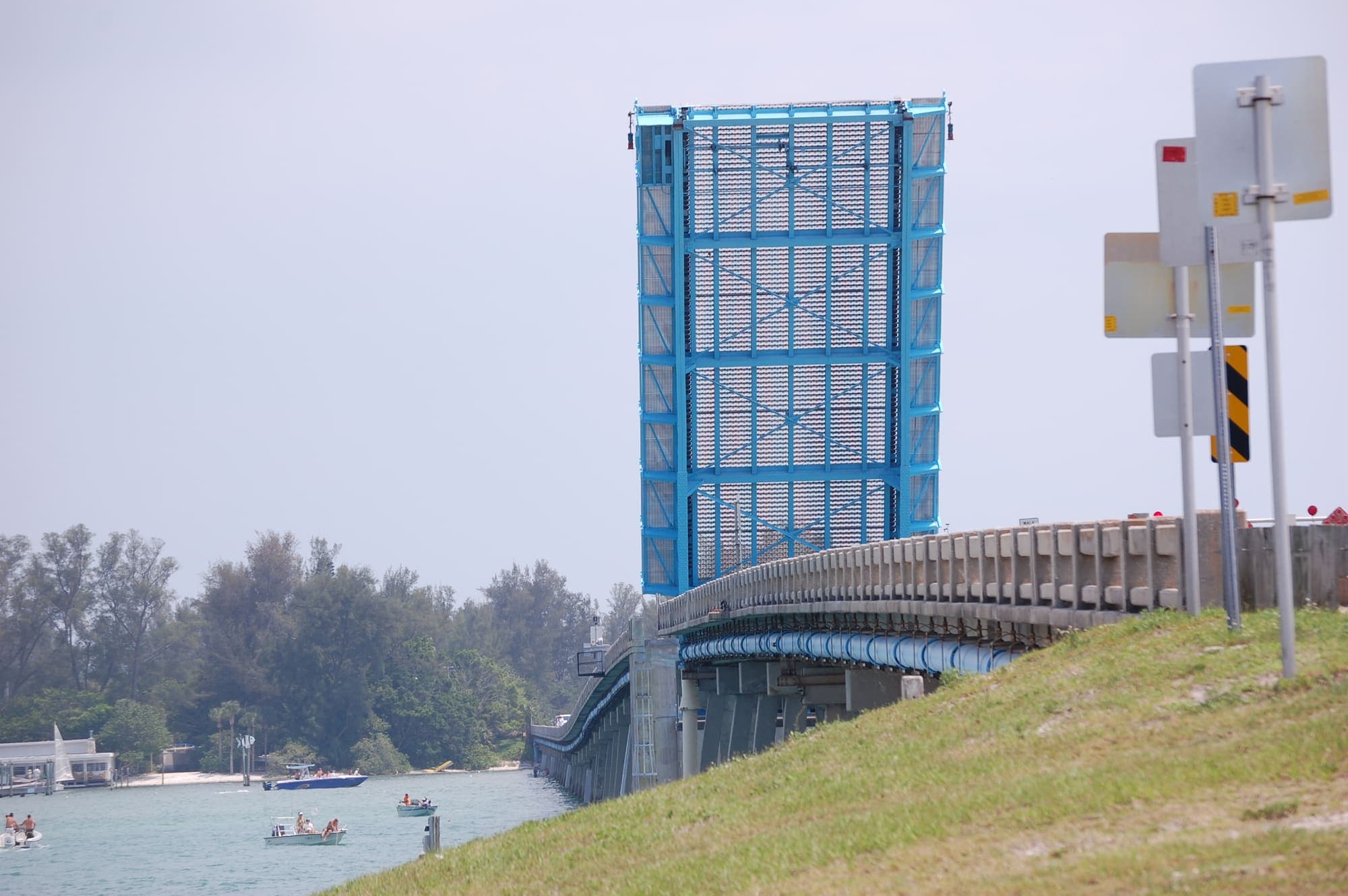 The Longboat Pass bascule bridge raised for a passing boat