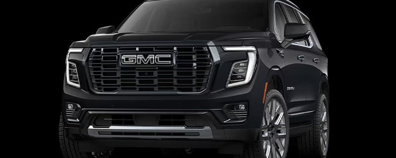 Black GMC Yukon Denali executive SUV staged as the wedding couple's private car at a Tampa Bay venue